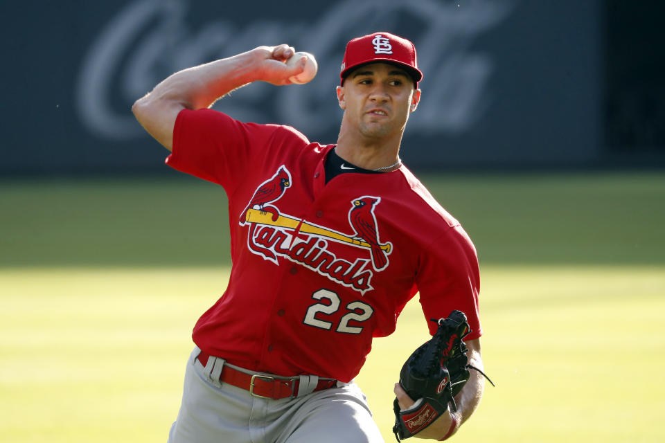 St. Louis Cardinals starting pitcher Jack Flaherty (22) throws in the outfield during a baseball practice Tuesday, Oct. 8, 2019, in Atlanta. Flaherty is scheduled to start for St. Louis when they face the Atlanta Braves in Game 5 of the NLCS Wednesday in Atlanta. (AP Photo/John Bazemore)