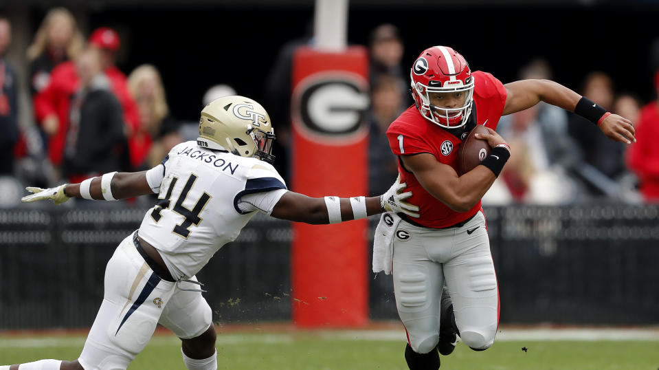 Georgia quarterback Justin Fields (1) is reportedly leaving the program after one season. (AP Photo/John Bazemore)