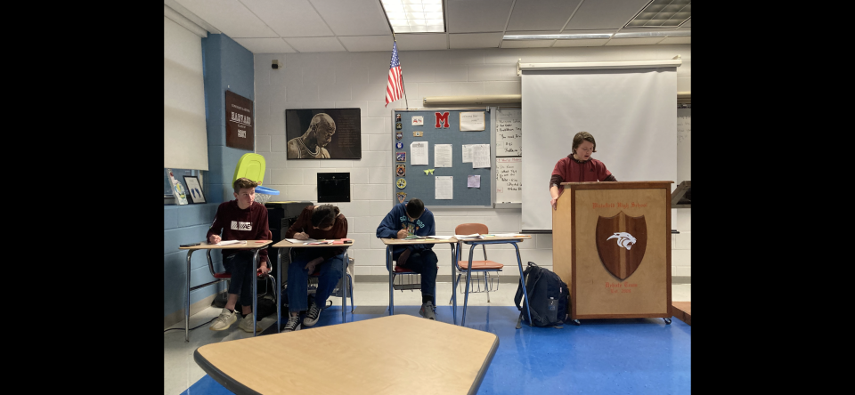 Members of the Plainfield High School debate team prepare for an upcoming regional tournament involving several local schools.