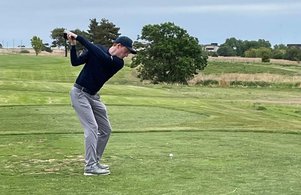 Olathe East senior Mason McKenna plays during the Kansas Class 6A high school golf championships at Mariah Hills Golf Course in Dodge City.