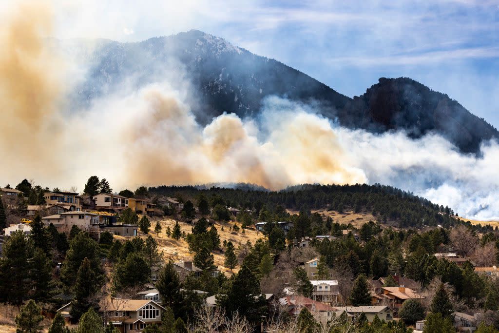 The NCAR Fire burns on March 26, 2022 in Boulder, Colorado. The wildfire, which has forced almost 20,000 people to evacuate their homes, started just a few miles away from where the Marshall Fire destroyed more than 1,000 homes in December, 2021.