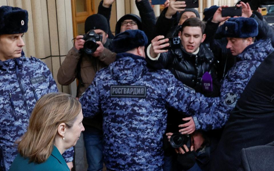 US ambassador to Russia Lynne Tracy walks out of the headquarters of Russia's foreign ministry after a meeting in Moscow - SHAMIL ZHUMATOV/REUTERS