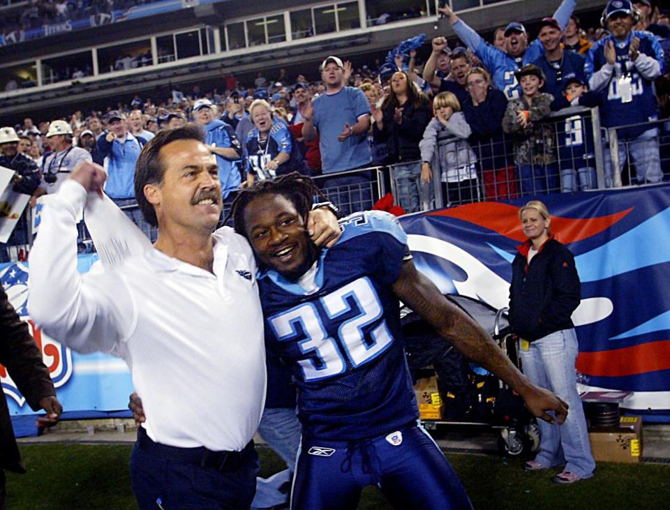 2006: Tennessee Titans head coach Jeff Fisher, left,  celebrates with Pacman Jones (32) following the Titans win over the New York Giants 24-21 at LP Field Nov. 26, 2006. It was the biggest fourth-quarter comeback in franchise history.