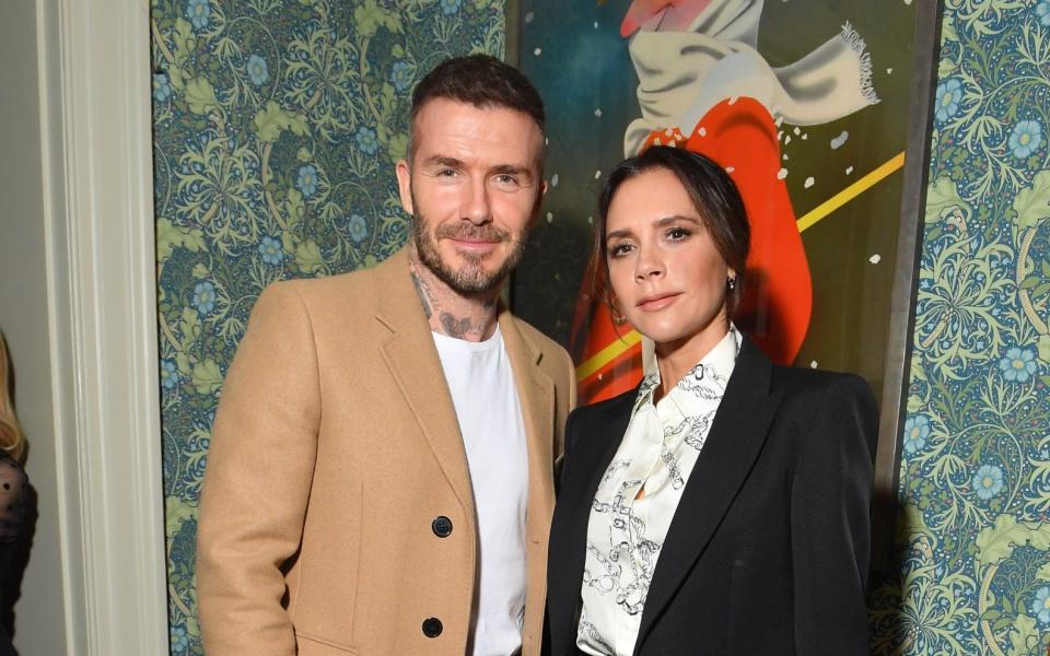 Victoria and David Beckham at London Fashion Week - Victor Boyko/Getty