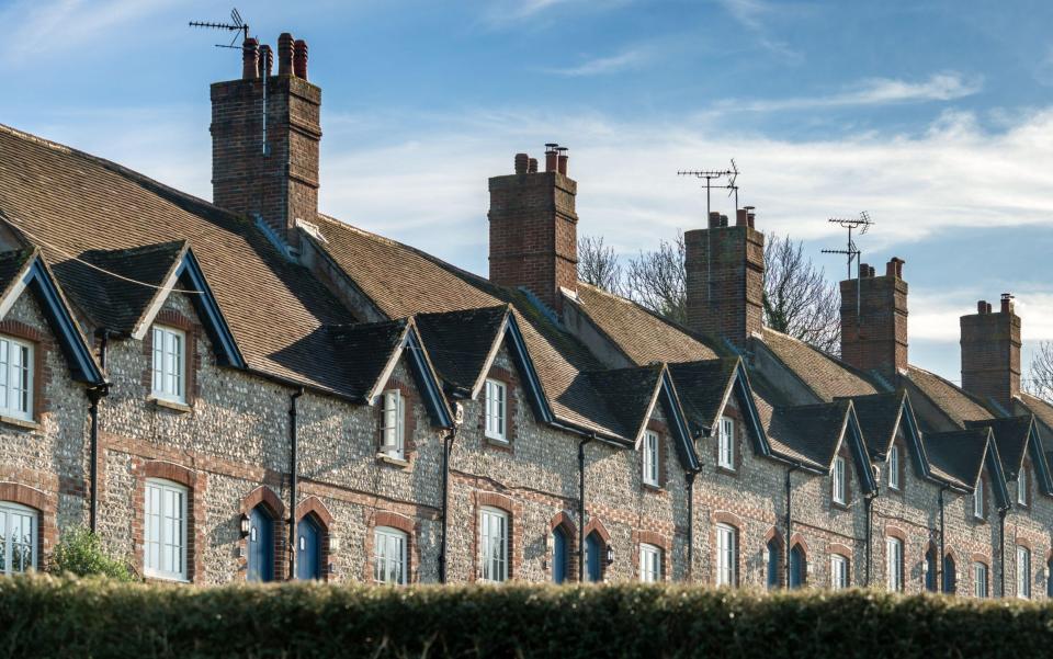 Many of the doors in the pretty stone village of Glynde are painted in the same dark blue colour