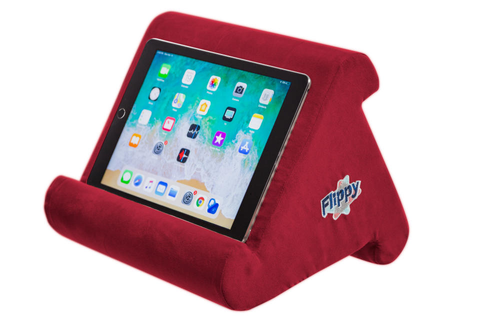 This photo shows the Flippy pillow device stand for tablets, books and e-readers. Chances are there’s at least one TV binger on your holiday gift list. Binge-worthy gifts are plentiful, from popcorn accessories to hydration, sound technology to comfort. (AP Photo/Happy Products, Inc).