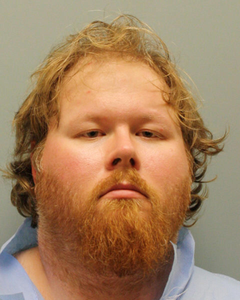 Ronald Lee Haskell, 33, is seen in an undated booking photo released by the Harris County Sheriff's Department in Harris County, Texas on July 10, 2014.  Haskell was charged with capital murder on Thursday after appearing at the house of his estranged wife's relatives disguised as a FedEx driver and gunning down a married couple and four of their children, authorities said.