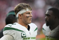 New York Jets quarterback Zach Wilson (2) stands on the field after an NFL football game between the New York Jets and the Atlanta Falcons at the Tottenham Hotspur stadium in London, England, Sunday, Oct. 10, 2021. Atlanta Falcons won the match 27-20. (AP Photo/Alastair Grant)