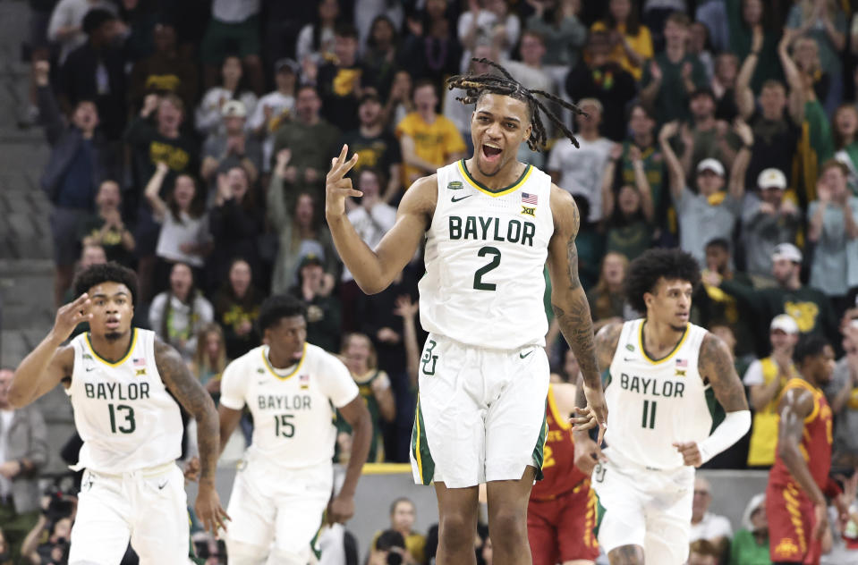 Baylor guard Jayden Nunn reacts after a 3-point basket oagainst Iowa State in the first half of an NCAA college basketball game, Saturday, Feb. 3, 2024, in Waco, Texas. (AP Photo/Rod Aydelotte)