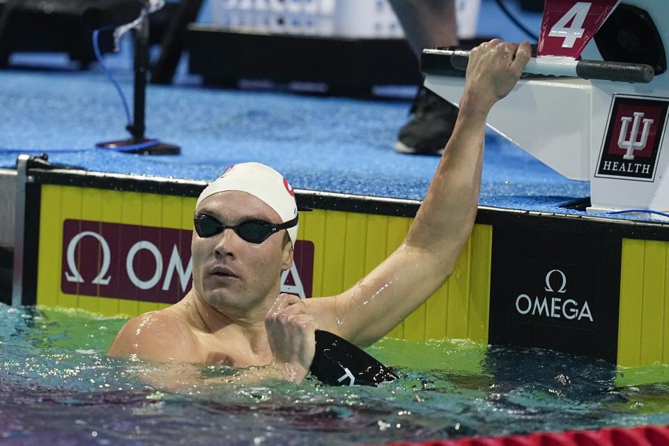 Bobby Finke looks at his time after winning the men's 800-meter freestyle at the U.S. nationals swimming meet, Saturday, July 1, 2023, in Indianapolis. (AP Photo/Darron Cummings)