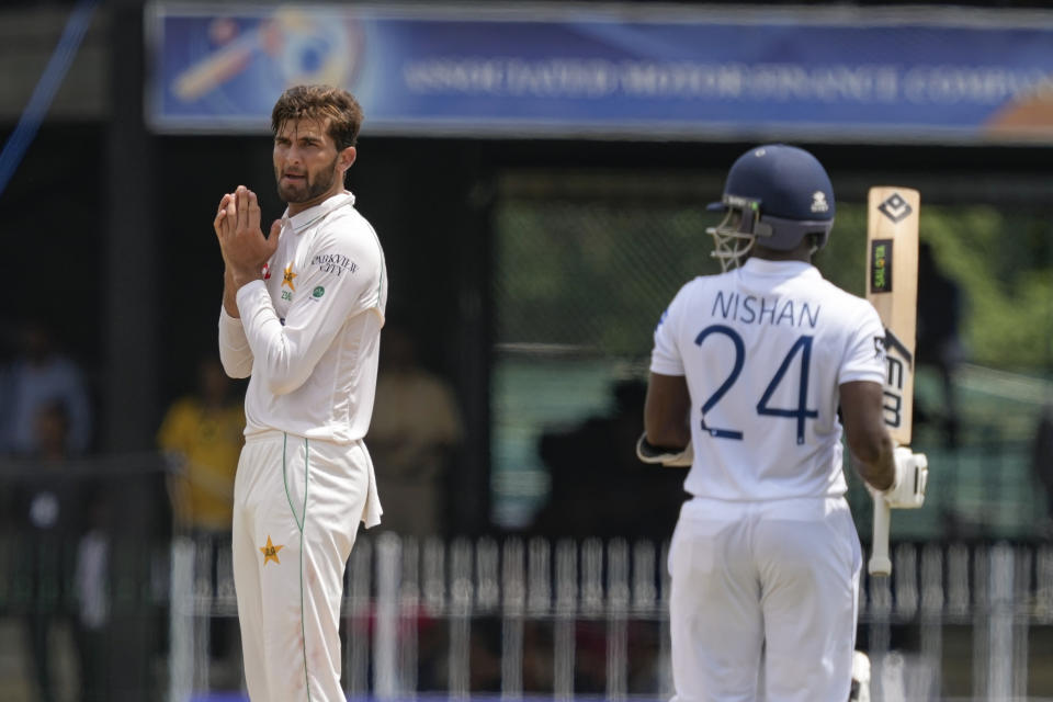 Pakistan's Shaheen Shah Afridi, left, reacts after Sri Lanka's Nishan Madushka hits a boundary during the fourth day of the second cricket test match between Sri Lanka and Pakistan in Colombo, Sri Lanka on Thursday, Jul. 27. (AP Photo/Eranga Jayawardena)