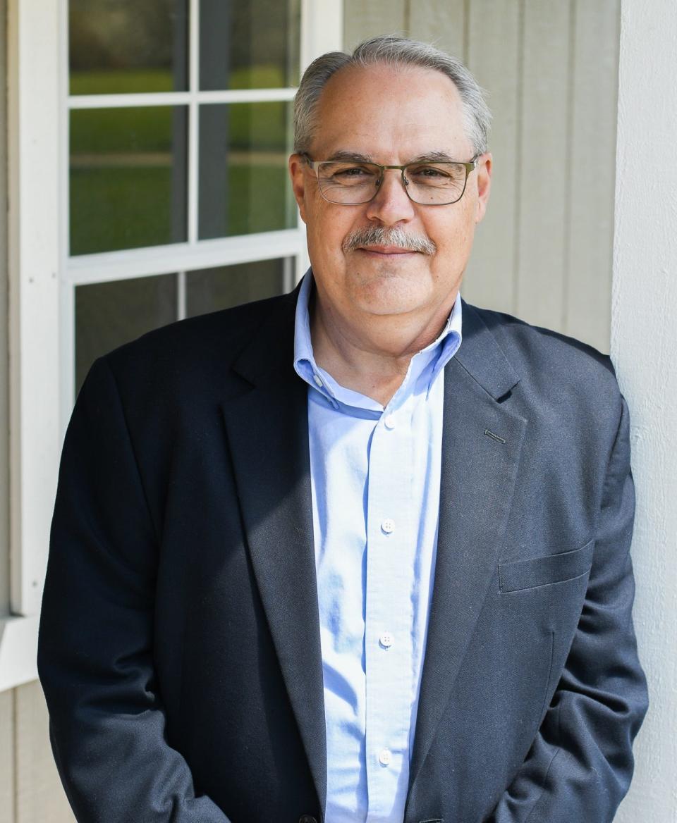 Mark Holbrook is the former executive director of the Marion Area Convention and Visitors Bureau. He has just released his first fiction novel.