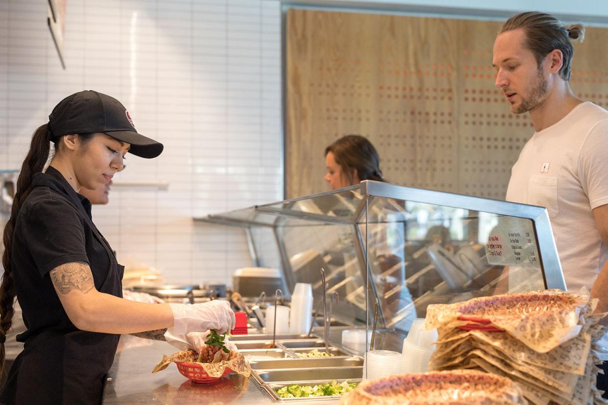 A Chipotle ordering bar.