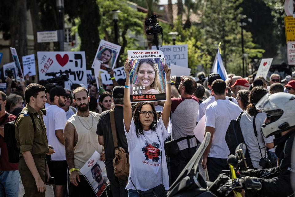 Israelis whose relatives are being held hostage in Gaza demonstrate in front of the Ministry of Defense in Tel Aviv on Oct. 26, 2023. (Mostafa Alkharouf / Anadolu via Reuters)