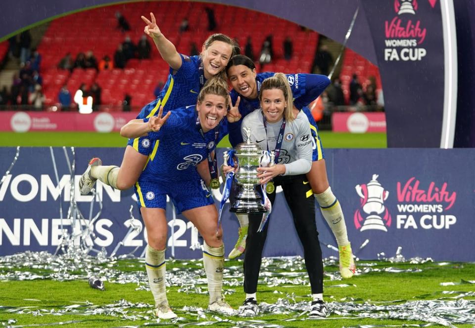 Clockwise from top left, Chelsea’s Erin Cuthbert, Sam Kerr, Carly Telford and Millie Bright celebrate with the trophy after the Vitality Women’s FA Cup final at Wembley (John Walton/PA) (PA Wire)