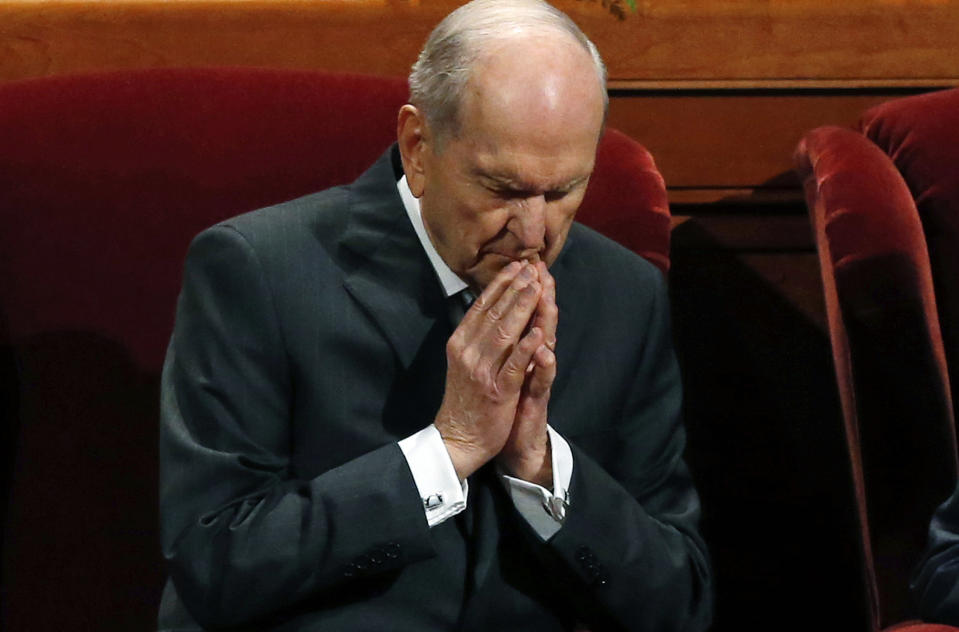 FILE - In this Oct. 6, 2018, file photo, The Church of Jesus Christ of Latter-day Saints President Russell M. Nelson prays during the church's twice-annual conference, in Salt Lake City. The recent slaying in Mexico of nine people who belonged to a Mormon offshoot community where some people practice polygamy shines a new spotlight on the ongoing struggle for the mainstream church to fight the association with plural marriage groups because of its past. The Church of Jesus Christ of Latter-day Saints issued a statement expressing sympathy for the victims, while also pointing out the people didn't belong to the church. (AP Photo/Rick Bowmer, File)