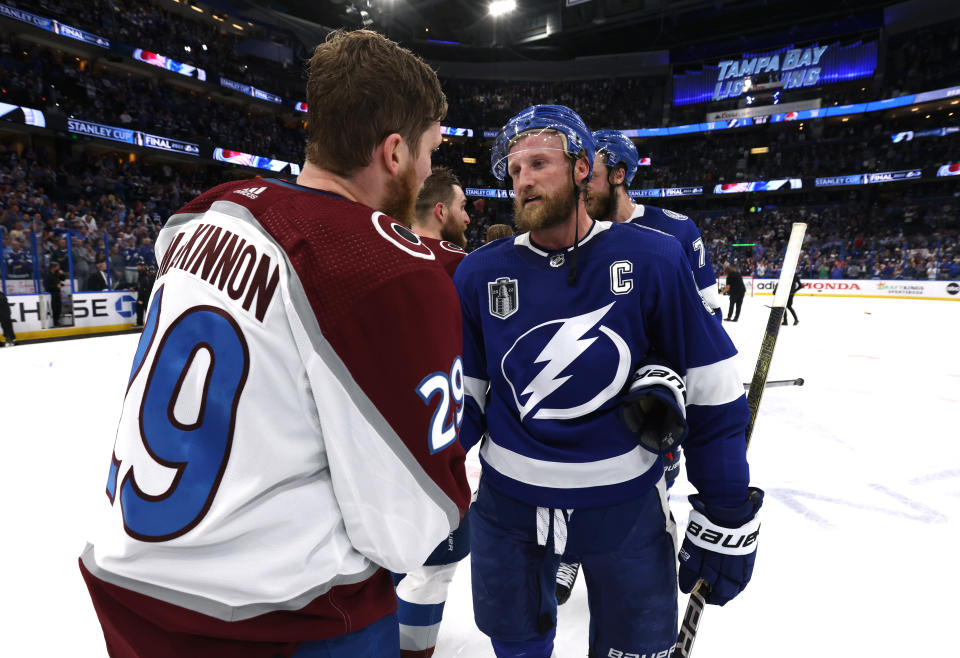 TAMPA, FLORIDA - JUNE 26: Nathan MacKinnon #29 of the Colorado Avalanche and Steven Stamkos #91 of the Tampa Bay Lightning shake hands after Game Six of the 2022 Stanley Cup Final at Amalie Arena on June 26, 2022 in Tampa, Florida. The Colorado Avalanche defeated the Tampa Bay Lightning 2-1 in Game Six to take the best of seven Stanley Cup Final series 4 games to 2.  (Photo by Dave Sandford/NHLI via Getty Images)