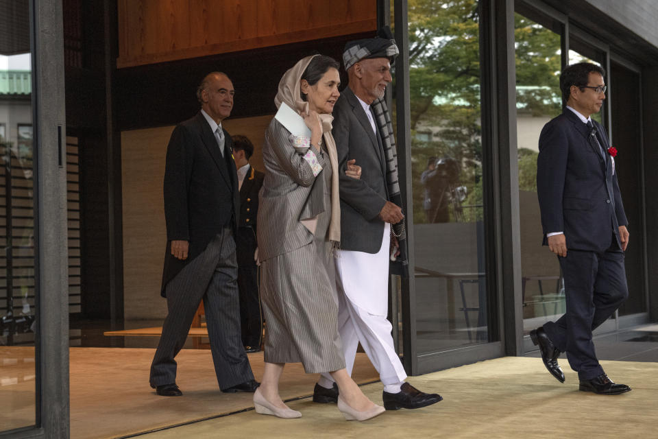 President of Afghanistan, Ashraf Ghani, and his wife Rula Ghani leave after attending the Enthronement Ceremony Of Emperor Naruhito of Japan at the Imperial Palace, Tuesday, Oct. 22, 2019, in Tokyo. (Carl Court/Pool Photo via AP)