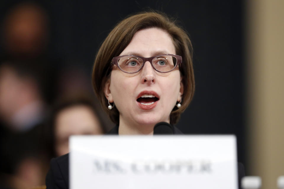 Deputy Assistant Secretary of Defense Laura Cooper testifies before the House Intelligence Committee on Capitol Hill in Washington, Wednesday, Nov. 20, 2019, during a public impeachment hearing of President Donald Trump's efforts to tie U.S. aid for Ukraine to investigations of his political opponents. (AP Photo/Andrew Harnik)