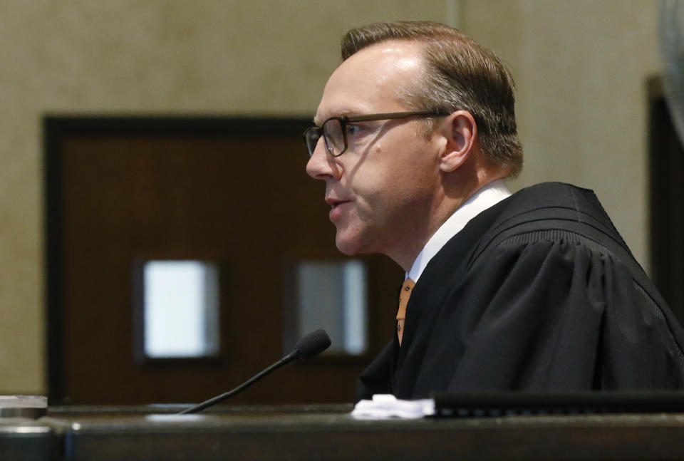 Judge Thad Balkman speaks at the conclusion of closing arguments in Oklahoma's ongoing opioid drug lawsuit against Johnson & Johnson, Monday, July 15, 2019, in Norman, Okla. (AP Photo/Sue Ogrocki, Pool)