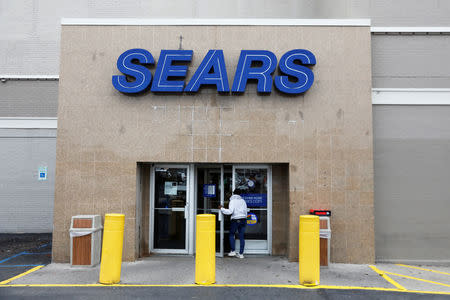 A person walks into a Sears store in Brooklyn, New York, U.S., October 10, 2018. REUTERS/Shannon Stapleton