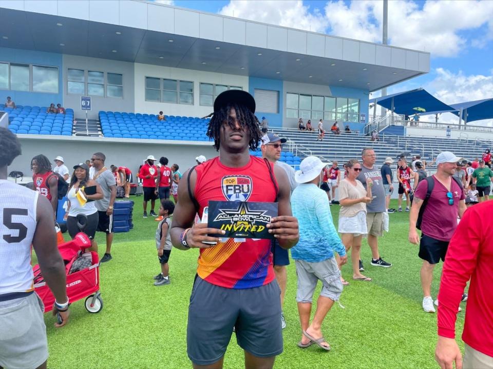 First Baptist Academy tight end Olsen Patt Henry stands with his US All- American Bowl Game invitation after the FBU Top Gun Showcase Sunday, July, 10 at the Paradise Coast Sports Complex.