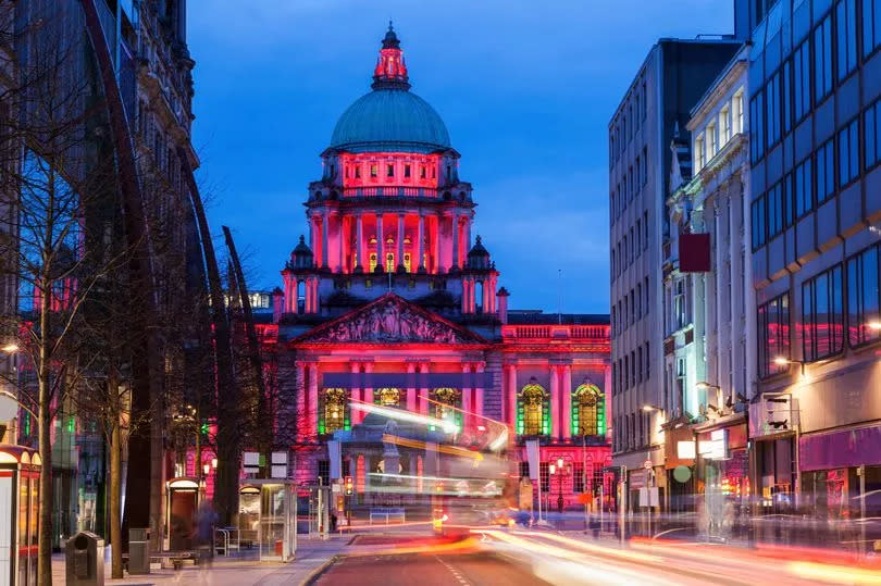 Belfast City Hall lit up pink -Credit:Getty