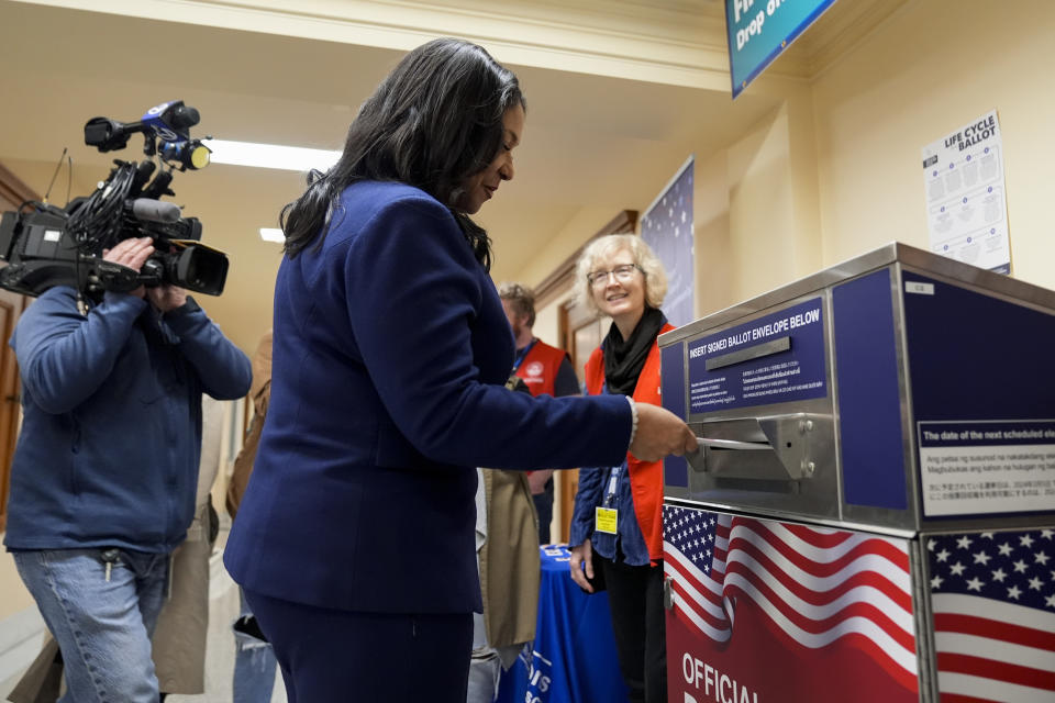 San Francisco Mayor London Breed, center, drops off her ballot for the state's primary election at City Hall, Tuesday, March 5, 2024, in San Francisco. (AP Photo/Godofredo A. Vásquez)