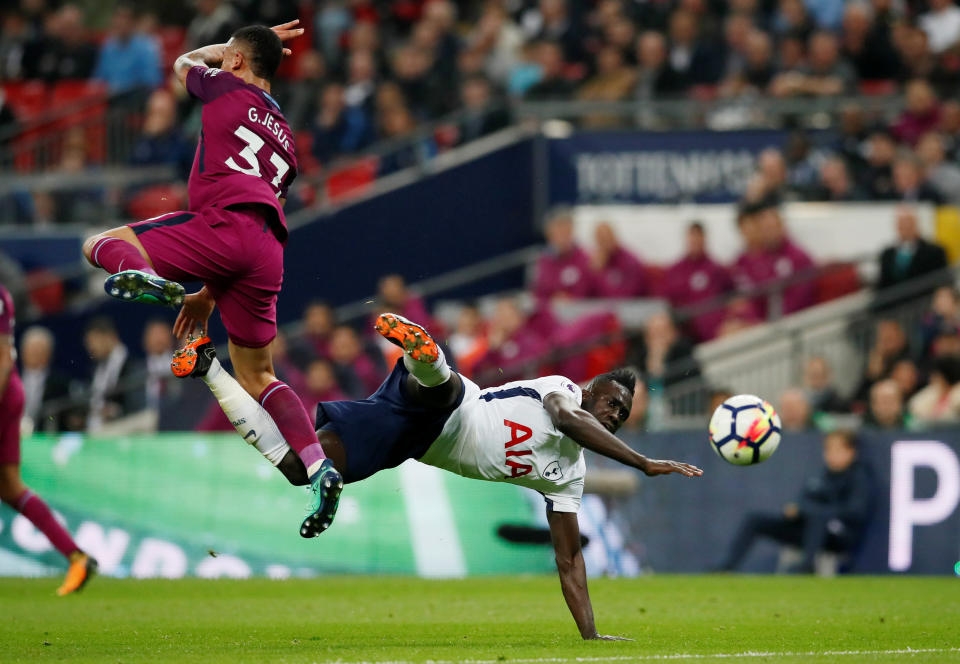 <p>Gabriel Jesus and Tottenham’s Davinson Sanchez get in a tangle </p>