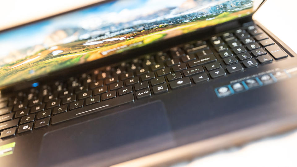 A black Acer Predator Helios Neo 16 gaming laptop on a white table