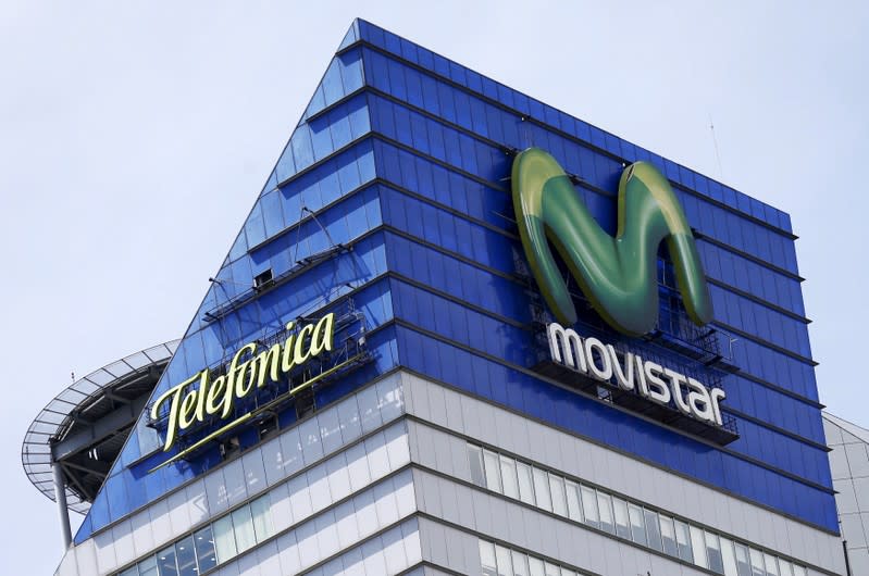 FILE PHOTO: Logos for Telefonica and its Movistar telecoms brands are seen on top of a Telefonica Mexico building, Mexico City, Mexico, April 15, 2016.