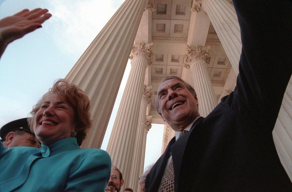 Bob Dole, with his wife, Elizabeth Dole, leaves the U.S. Capitol on June 11, 1996, after he ended 35 years in the Senate to turn his full attention to his presidential campaign.