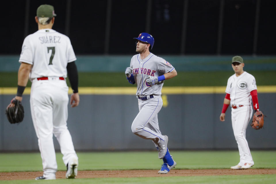 New York Mets' Jeff McNeil runs the bases after hitting a solo home run off Cincinnati Reds starting pitcher Luis Castillo in the sixth inning of a baseball game Friday, Sept. 20, 2019, in Cincinnati. (AP Photo/John Minchillo)