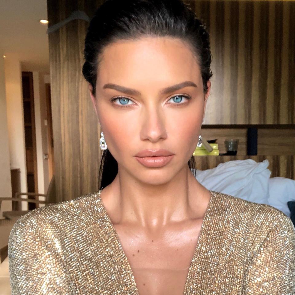 An exclusive look at how Adriana Lima got ready for amfAR in Cannes.