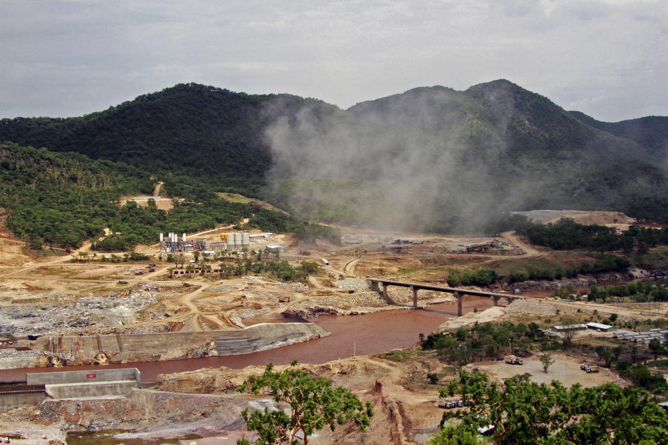 FILE - In this June 28, 2013 file photo, The Blue Nile river flows near the site of the planned Grand Ethiopian Renaissance Dam near Assosa in the Benishangul-Gumuz region of Ethiopia, near Sudan, some 800 kilometers (500 miles) from the capital Addis Ababa. Egypt wants the United Nations Security Council to "undertake its responsibilities" and prevent Ethiopia from starting to fill its massive, newly built hydroelectric dam on the Nile River next month amid a breakdown in negotiations, Egyptian Foreign Minister Sameh Shukry told The Associated Press on Sunday, June 21, 2020 accusing Ethiopian officials of stoking antagonism between the countries. (AP Photo/Elias Asmare, File)