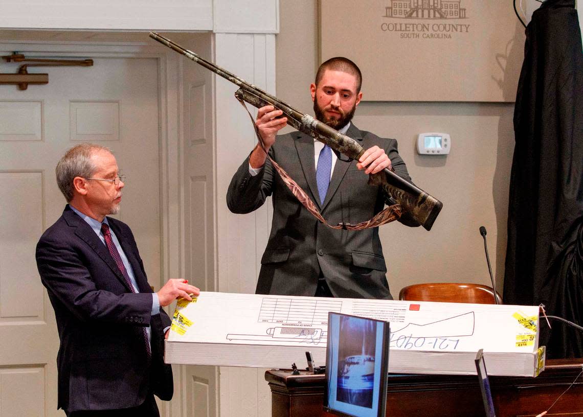 Chief prosecuting attorney Creighton Waters asks Daniel Greene, sergeant with the Colleton County Sheriff’s Office to identify the 12-gauge shotgun, presented as evidence, Alex Murdaugh said he grabbed after discovering his wife and son had been killed during the murder trial at the Colleton County Courthouse in Walterboro, Thursday, Jan. 26, 2023. Grace Beahm Alford/The Post and Courier/Pool