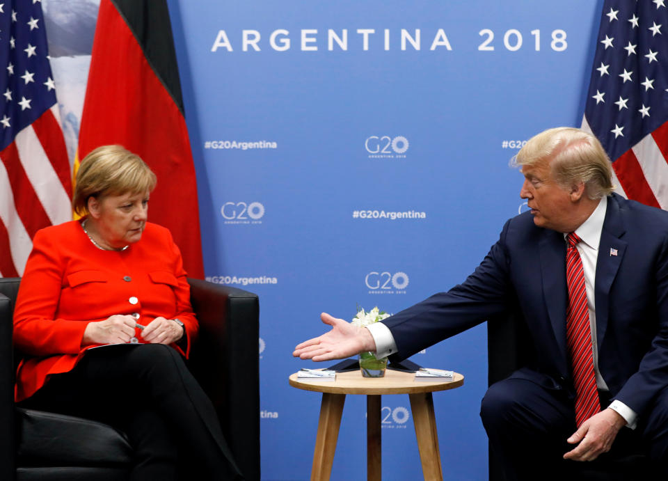President Donald Trump and German Chancellor Angela Merkel attend a meeting during the G20 leaders summit in Buenos Aires, Argentina, Dec. 1, 2018. (Photo: Kevin Lamarque/Reuters)