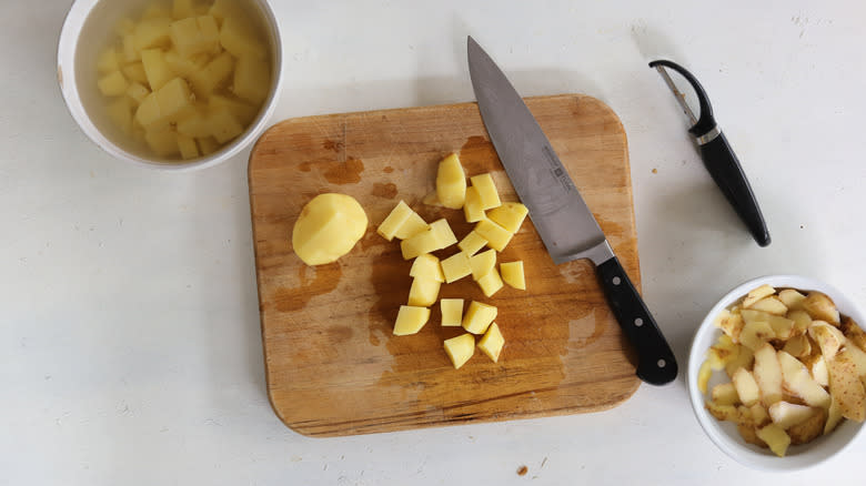 cut potatoes in water