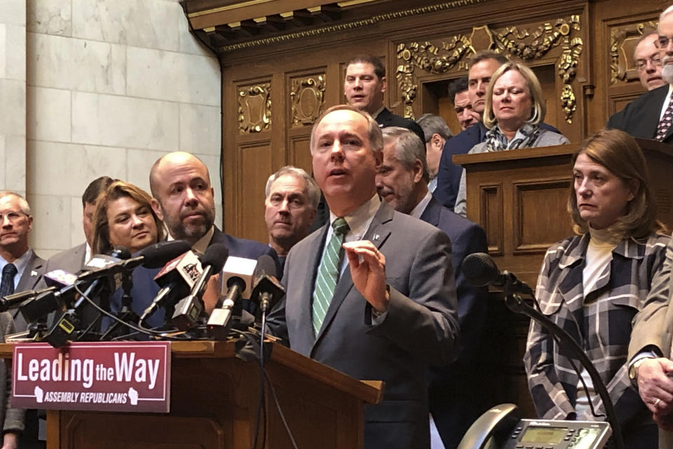 Wisconsin Assembly Speaker Robin Vos speaks to reporters in the Assembly chamber ahead of their final day in session Thursday, Feb. 20, 2020, in Madison, Wis. Vos says he hopes Democratic Gov. Tony Evers will sign into law a GOP income tax cut proposal passing the Legislature on Thursday. (AP Photo/Scott Bauer)