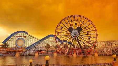 Disneyland is seen as wildfires rage in California, Anaheim, California, U.S. October 9, 2017 in this picture obtained from social media. INSTAGRAM /@KENNYA.BOULTER/Kennya Boulter via REUTERS