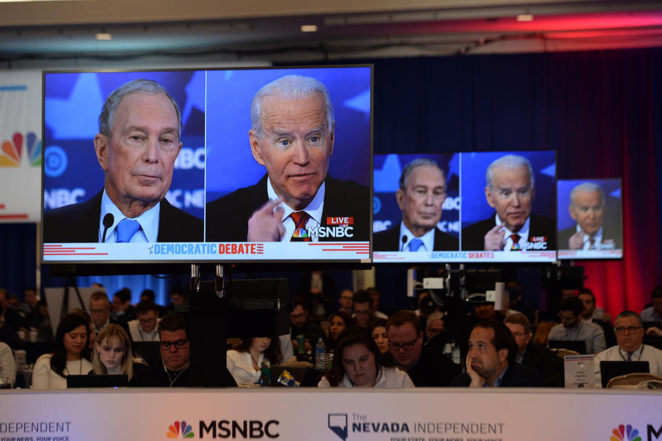 Democratic presidential hopefuls Former New York Mayor Mike Bloomberg (L) and Former Vice President Joe Biden (R) are seen on screens in a media room during the ninth Democratic primary debate of the 2020 presidential campaign season co-hosted by NBC News, MSNBC, Noticias Telemundo and The Nevada Independent at the Paris Theater in Las Vegas, Nevada, on February 19, 2020. (Photo by Bridget BENNETT / AFP) (Photo by BRIDGET BENNETT/AFP via Getty Images)