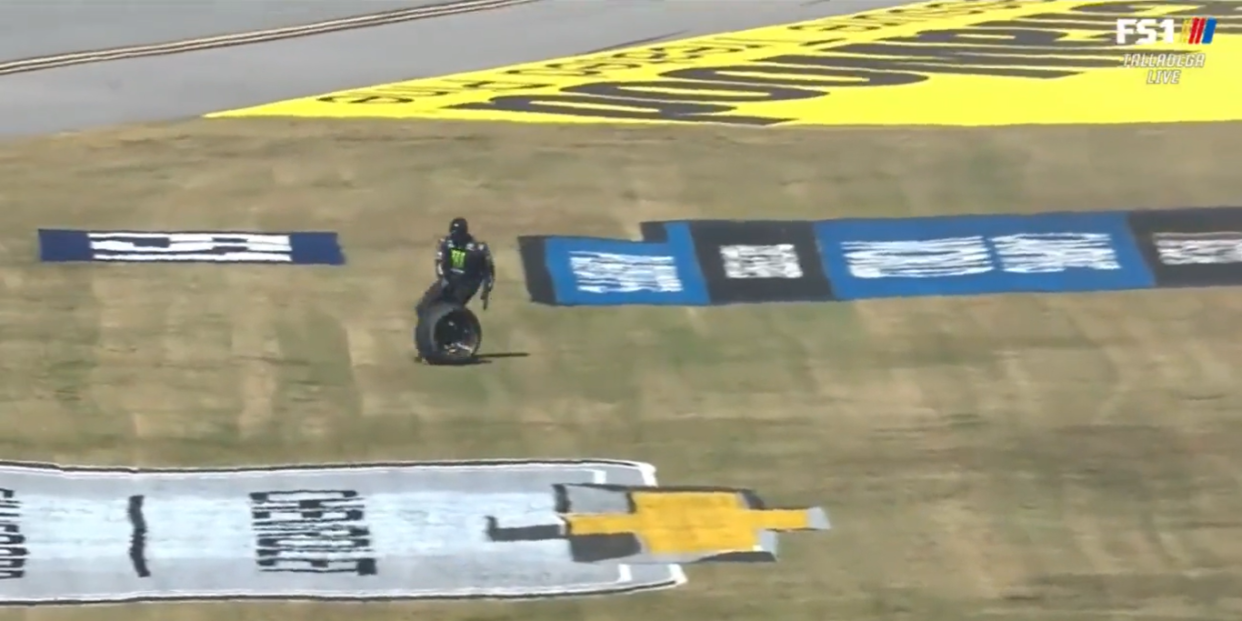 nascar crew member chases tire