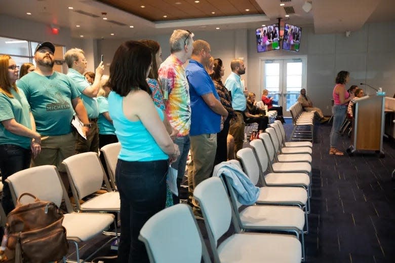 Supporters of Nicole Schuster, a third-grade teacher who was accused on inappropriately helping students on their STAAR tests, attend an El Paso ISD Board of Trustees meeting on May 21, 2024.