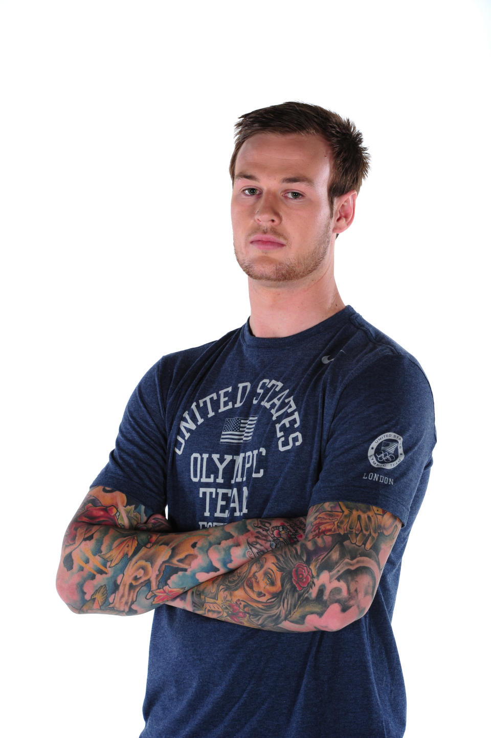 Cyclist Nic Long's tattoo sleeves can be seen as he poses for a portrait during the USOC Portrait Shoot at Smashbox West Hollywood on November 18, 2011 in West Hollywood, California. (Photo by Harry How/Getty Images for USOC)