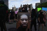 Protest against the death in Minneapolis police custody of African-American man George Floyd and the assault of Sha'Teina and Dan Grady El by Washtenaw County police, in Detroit