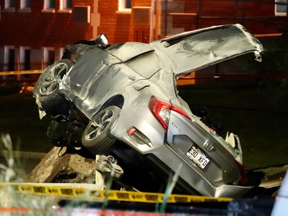 Two people were injured after a driver crashed into a block of concrete following a police chase. (Stéphane Grégoire / Radio-Canada - image credit)