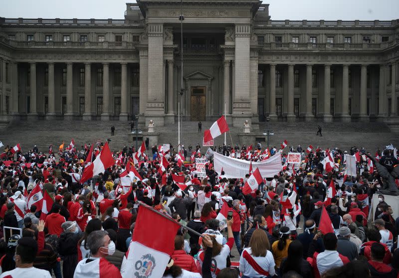 FILE PHOTO: Supporters of Peru's presidential candidate Keiko Fujimori gather outside the Palace of Justice, the seat of Peru's Supreme Court, during a demonstration in Lima