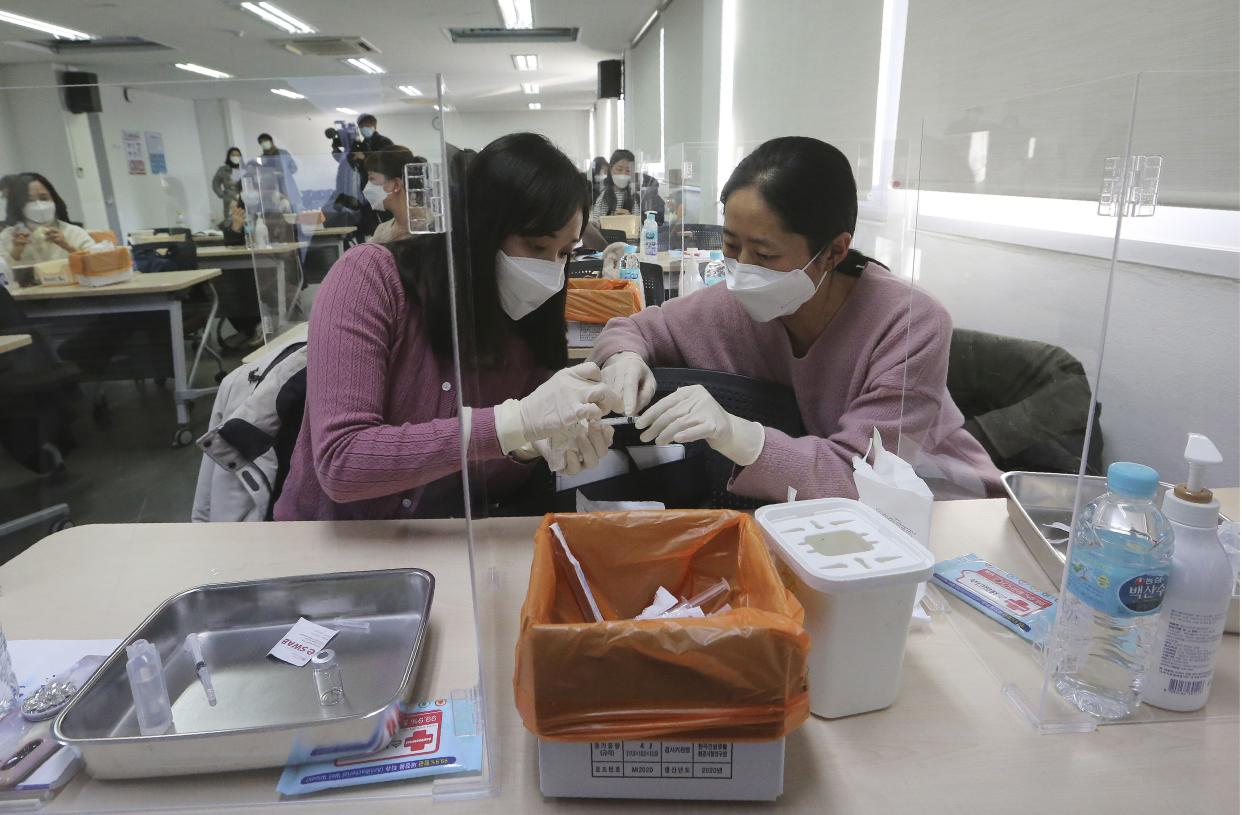 Medical workers attend training to learn how to give coronavirus vaccine shots at the Korean Nurses Association in Seoul, South Korea on Wednesday, Feb. 17, 2021. South Korea plans to start coronavirus inoculations on Feb. 26 with AstraZeneca's COVID-19 vaccine.