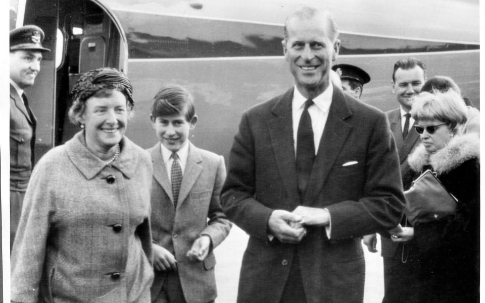 The Prince of Wales making his first air trip with his father Prince Philip arriving at Frankfurt,West germany for a private visit to Prince Philip's relatives.At the airport to greet them was Princess Margaret of Hesse (l) Prince Philip's sister. - AP