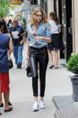 <p>Out in New York wearing a denim button-down shirt with lace-up leather pants by Unravel, plus Adidas sneakers. </p>